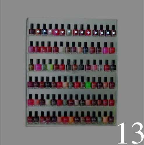 GroundingREC prediction for nail polish in the top layer